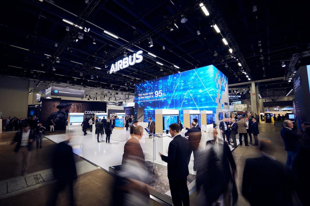 Lit Airbus stand in a dark hall