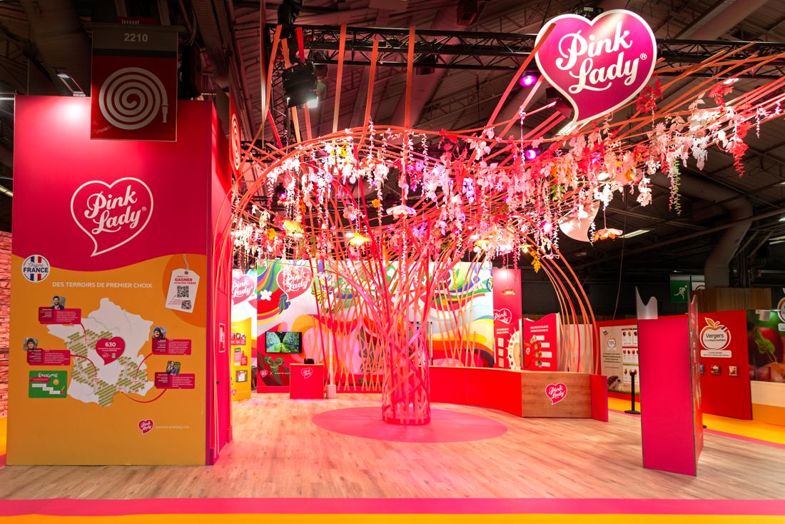 Pink Lady stand with illuminated tree